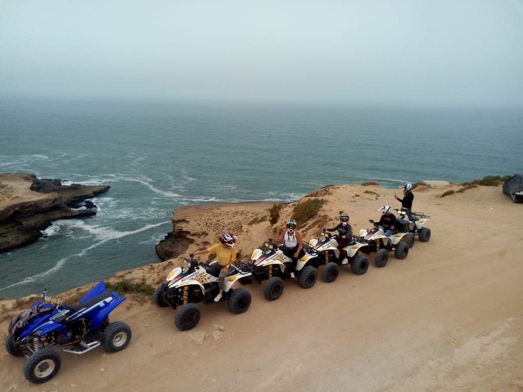 Quad biking on sandy dunes