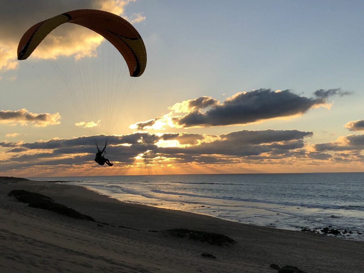 Paragliding over coastal cliffs